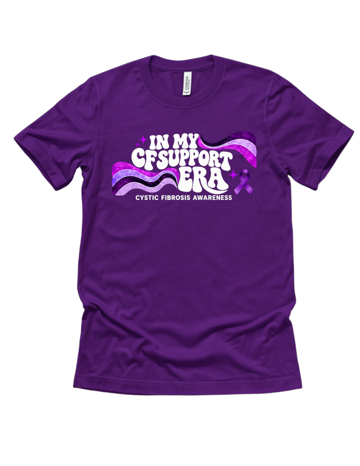 Purple In My CF Support Era T-shirt with bold lettering and purple ribbon details