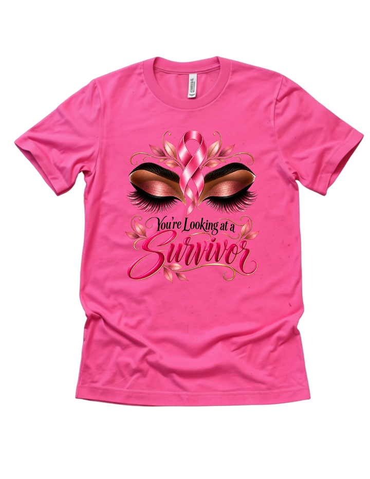 You’re Looking at a Survivor breast cancer awareness design on a pink adult T-shirt